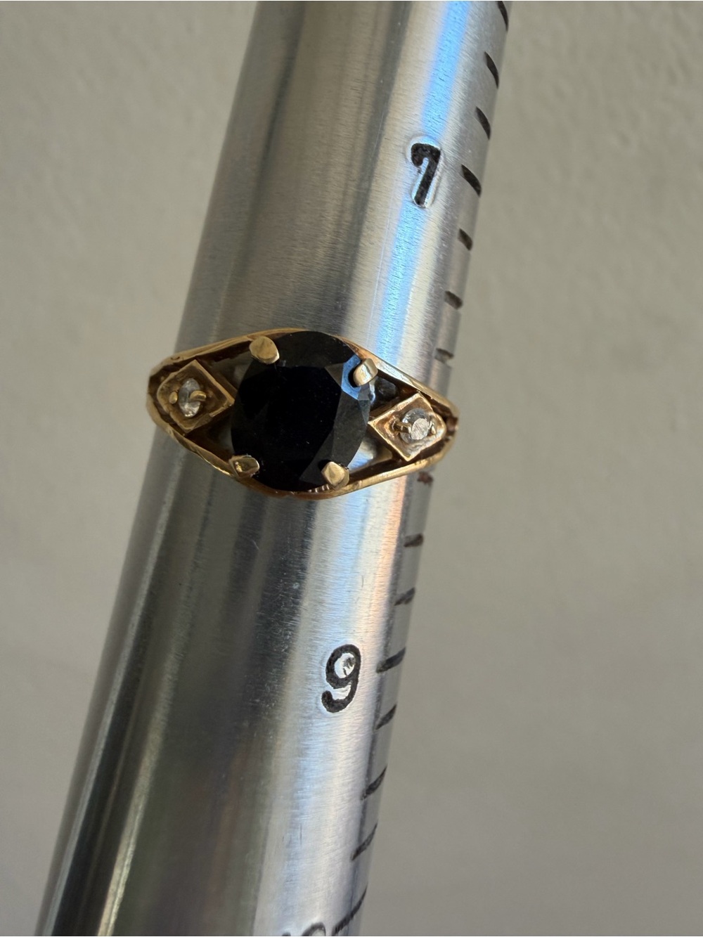 10k yellow Gold Ring with Black Center Stone and Accent Diamonds